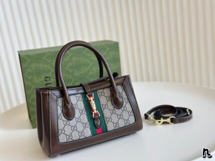 Gucci Jackie 1961 Series Small Tote Bag With Top Handle, Removable Shoulder Strap, Gold-Tone Lock, And Red And Green Stripes.