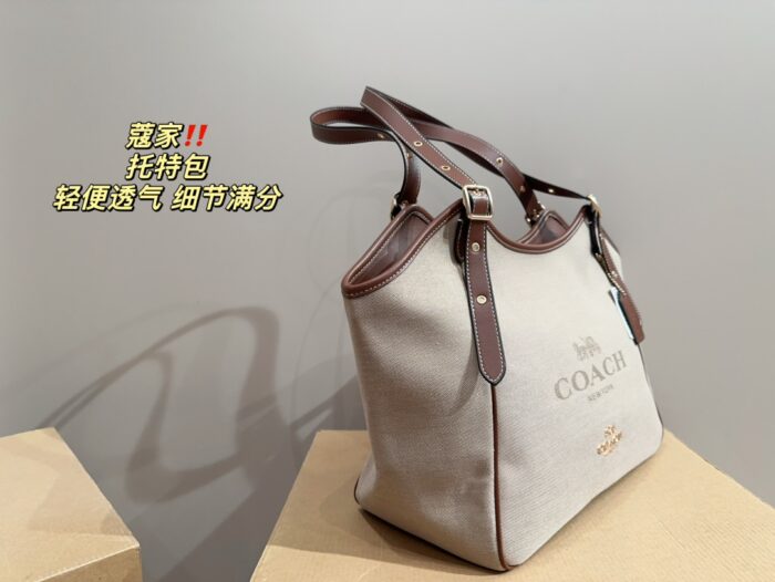 Coach Canvas Tote With Snap Button Design – A Versatile And Fashionable Handbag. - Image 3