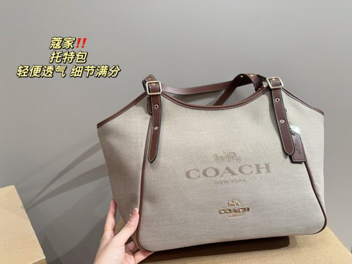 Coach Canvas Tote With Snap Button Design – A Versatile And Fashionable Handbag. - Image 5
