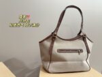 Coach Canvas Tote With Snap Button Design – A Versatile And Fashionable Handbag. - Image 7