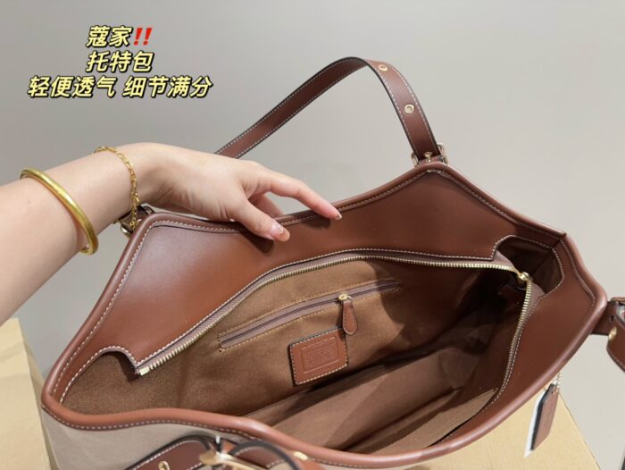 Coach Canvas Tote With Snap Button Design – A Versatile And Fashionable Handbag. - Image 9
