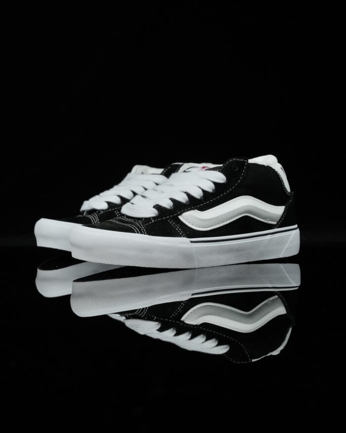 Vans Classic Black and White Mid-Top Skate Shoes - Image 1