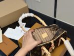 Louis Vuitton Hangon Bowling Bag: Compact Yet Surprisingly Spacious. - Image 4