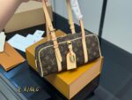 Louis Vuitton Hangon Bowling Bag: Compact Yet Surprisingly Spacious. - Image 5