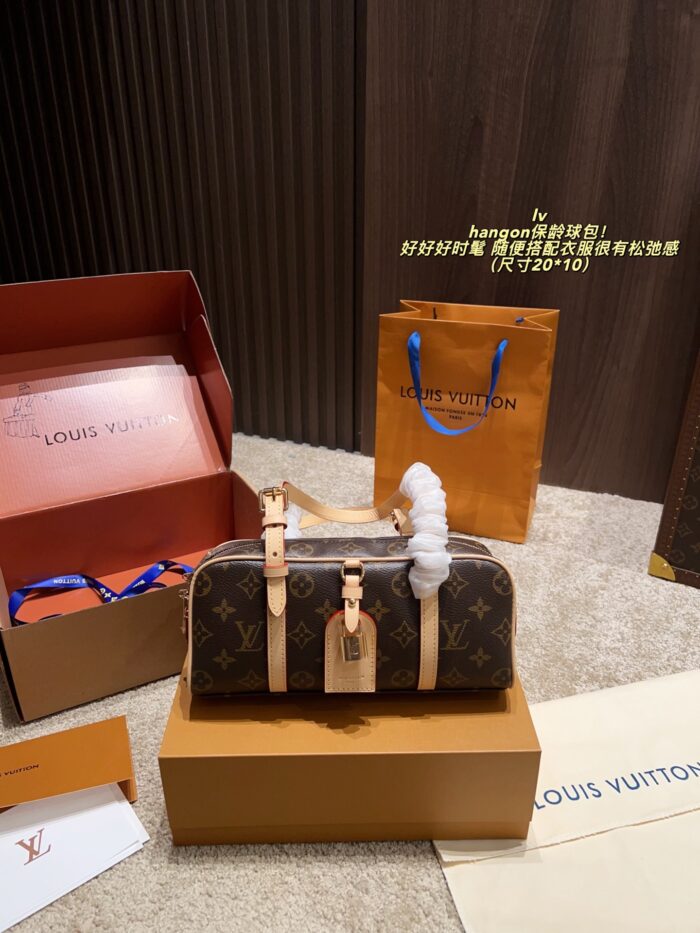 Louis Vuitton Hangon Bowling Bag Stylish And Relaxed Features Colour-Changing Leather Comes With A Box - Image 1