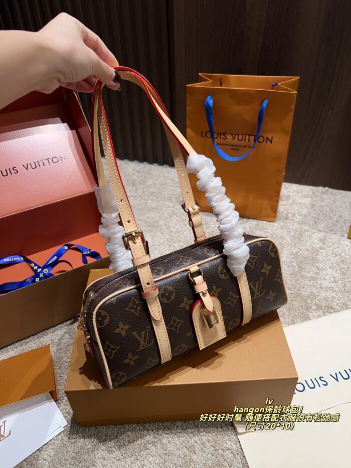 Louis Vuitton Hangon Bowling Bag Stylish And Relaxed Features Colour-Changing Leather Comes With A Box - Image 2