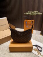 Louis Vuitton Cookie Bb Underarm Bag. Reversible Monogram Flying Saucer Design. Lightweight Yet Spacious.