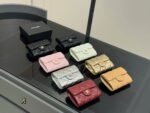 Chanel Black Gold Mini Chain Wallet Classic Black With Shimmering Gold Chain Design Compact And Portable