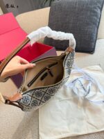 Tory Burch Classic Monogram Underarm Bag With Double T Hardware And Versatile Carrying Options - Image 9