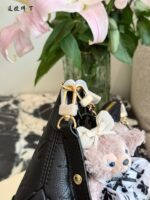 Louis Vuitton 2025 New Black Full-Leather Horn Bag With Leather-Wrapped Chain - Understated And Timeless - Image 6