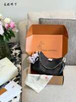 Louis Vuitton 2025 New Black Full-Leather Horn Bag With Leather-Wrapped Chain - Understated And Timeless - Image 9
