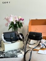 Louis Vuitton Diane Handbag Monogram Empreinte Embossed Leather Baguette Embossing With Charms Removable Shoulder Strap
