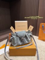 Louis Vuitton Odyssee Denim Shoulder Bag Effortlessly Chic, Laid-Back Sophistication Shoulder, Crossbody Or Handheld