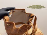 Mcm Drawstring Bucket Bag Structured, Minimalist, Vintage-Chic Effortlessly Sophisticated For Everyday Styling - Image 9
