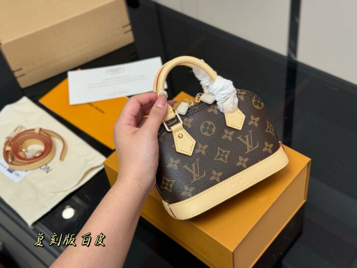 Louis Vuitton Alma Shell Bag Classic, Versatile And Understated Handbag - Image 2