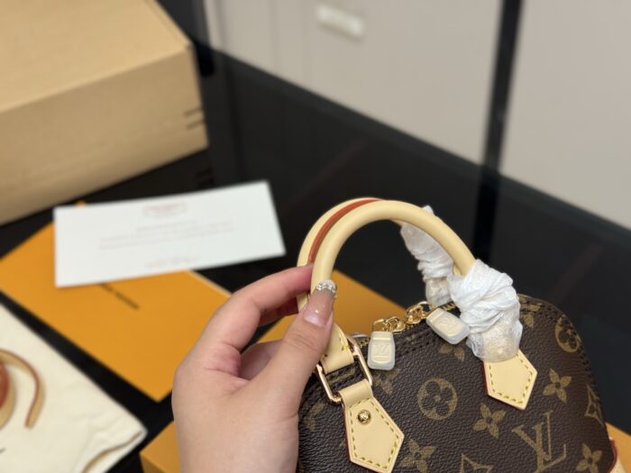 Louis Vuitton Alma Shell Bag Classic, Versatile And Understated Handbag - Image 3