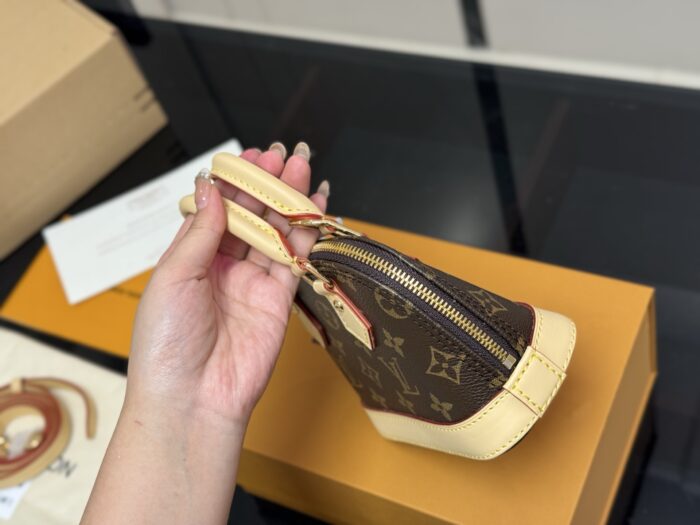 Louis Vuitton Alma Shell Bag Classic, Versatile And Understated Handbag - Image 6