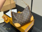 Louis Vuitton Vintage Horn Bag Vintage Classic Shoulder Bag With Shoulder Strap And Chain Versatile For Both Shoulder And Crossbody Carry - Image 2