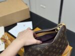 Louis Vuitton Vintage Horn Bag Vintage Classic Shoulder Bag With Shoulder Strap And Chain Versatile For Both Shoulder And Crossbody Carry - Image 4