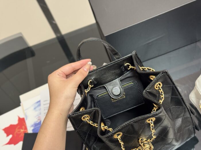 Chanel 25B Bag Backpack: Versatile Styling For Charming Sophistication In Black And Gold - Image 4