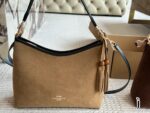 Coach'S New Laurel Wander Bag Features Dual Straps For Versatile Styling And An Internal Zipped Side Pocket.