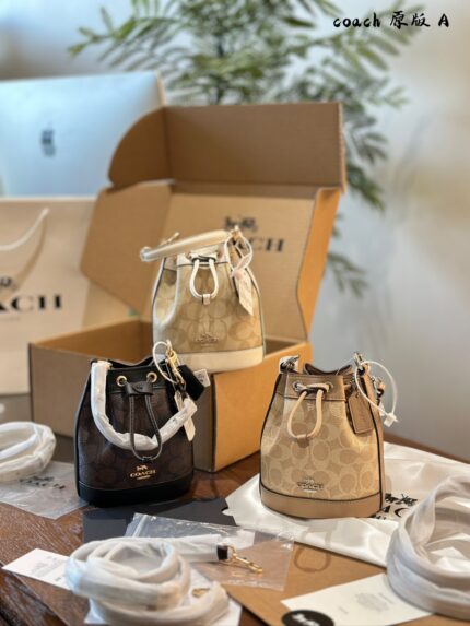 Coach Dempsey Mini Bucket Bag With Wide Shoulder Strap, Handle & Crossbody Option, Drawstring Closure