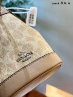 Coach Dempsey Mini Bucket Bag With Wide Shoulder Strap, Handle & Crossbody Option, Drawstring Closure - Image 9