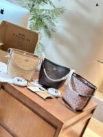 Coach Newcity Bucket Bag Dual-Strap Versatility Light Tea-Coloured New Shade Lightweight And Practical - Image 17