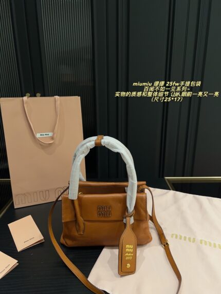 Miu Miu 25Fw 'Seeing Is Believing' Collection Handbag Triple Compartment Distressed Logo Structured Silhouette