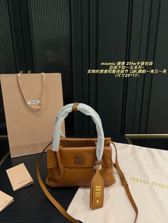 Miu Miu 25Fw 'Seeing Is Believing' Collection Handbag Triple Compartment Distressed Logo Structured Silhouette - Image 1