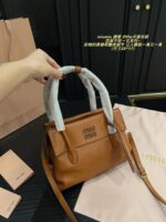 Miu Miu 25Fw 'Seeing Is Believing' Collection Handbag Triple Compartment Distressed Logo Structured Silhouette - Image 9