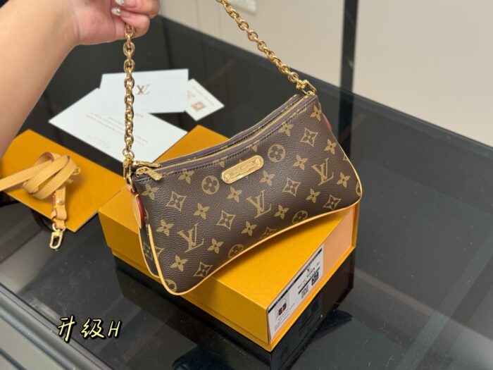 Louis Vuitton Mahjong Bag Dual-Strap Design Can Be Worn Crossbody, Over The Shoulder Or Carried By Hand Adorable And Practical! - Image 2