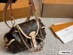 Louis Vuitton Odyssée Metal Chain Handbag With Shoulder Strap And Crossbody Option, Side Pocket Design - Image 4