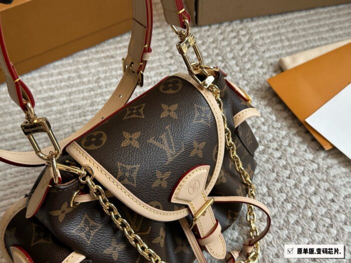 Louis Vuitton Odyssée Metal Chain Handbag With Shoulder Strap And Crossbody Option, Side Pocket Design - Image 5
