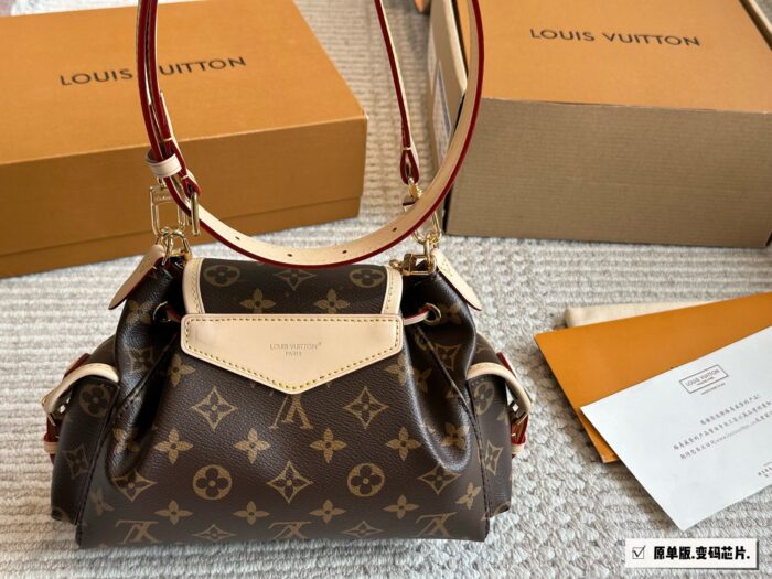 Louis Vuitton Odyssée Metal Chain Handbag With Shoulder Strap And Crossbody Option, Side Pocket Design - Image 6