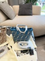 Fendi Mini Roll Monogram Bag - Dumpling-Shaped Design With Adjustable Shoulder Strap, Lightweight Yet Spacious. - Image 2