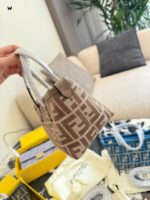 Fendi Mini Roll Monogram Bag - Dumpling-Shaped Design With Adjustable Shoulder Strap, Lightweight Yet Spacious. - Image 6