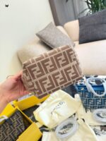 Fendi Mini Roll Monogram Bag - Dumpling-Shaped Design With Adjustable Shoulder Strap, Lightweight Yet Spacious. - Image 7