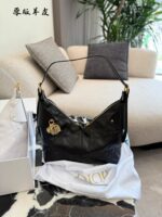 Dior Voyage Collection Handbag Vintage-Inspired Oiled Leather Letter-Embossed Hardware Adjustable Shoulder Strap Spacious Capacity Sporty Travel Companion - Image 2