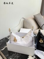 Dior Voyage Collection Handbag Vintage-Inspired Oiled Leather Letter-Embossed Hardware Adjustable Shoulder Strap Spacious Capacity Sporty Travel Companion - Image 3