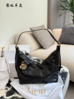 Dior Voyage Collection Handbag Vintage-Inspired Oiled Leather Letter-Embossed Hardware Adjustable Shoulder Strap Spacious Capacity Sporty Travel Companion - Image 7