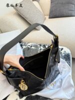 Dior Voyage Collection Handbag Vintage-Inspired Oiled Leather Letter-Embossed Hardware Adjustable Shoulder Strap Spacious Capacity Sporty Travel Companion - Image 8