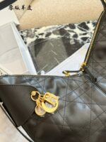 Dior Voyage Collection Handbag Vintage-Inspired Oiled Leather Letter-Embossed Hardware Adjustable Shoulder Strap Spacious Capacity Sporty Travel Companion - Image 9