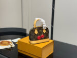 Louis Vuitton Alma Shell Bag Timeless Versatility Cherry Pattern