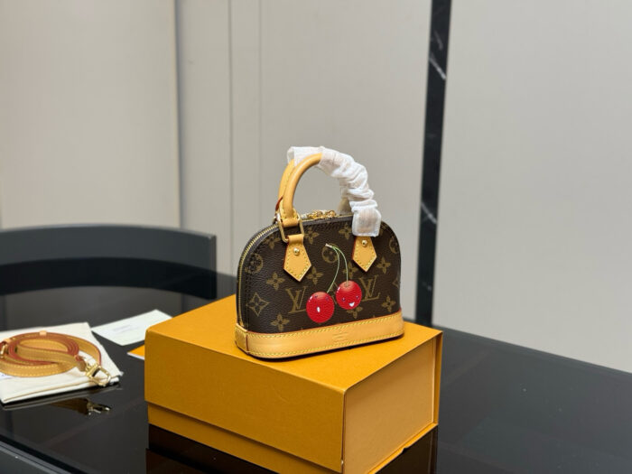 Louis Vuitton Alma Shell Bag Timeless Versatility Cherry Pattern - Image 1