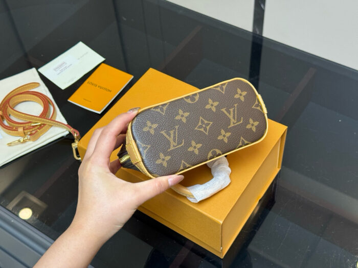 Louis Vuitton Alma Shell Bag Timeless Versatility Cherry Pattern - Image 8