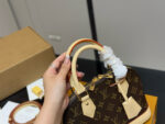 Louis Vuitton Alma Shell Bag Classic Versatility Original Hardware - Image 3