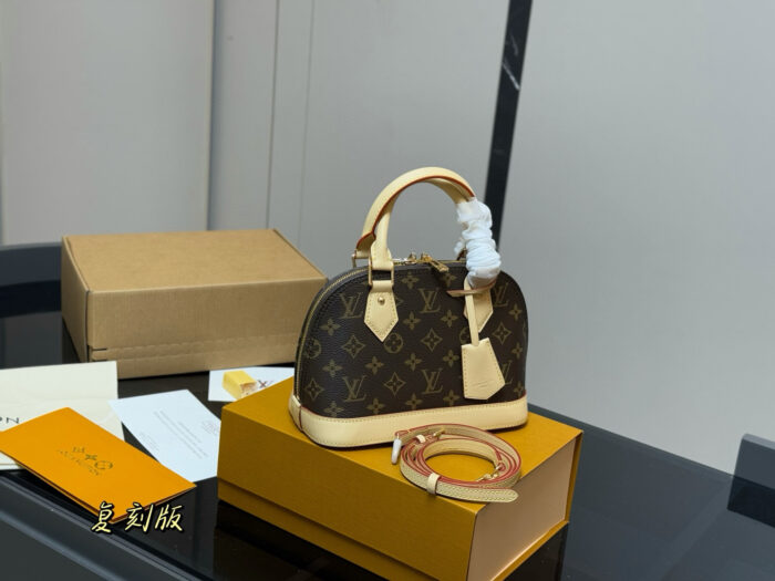 Louis Vuitton Alma Shell Bag Classic Versatility Original Hardware - Image 5