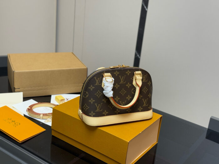 Louis Vuitton Alma Shell Bag Classic Versatility Original Hardware - Image 8