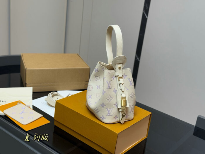 Louis Vuitton Vintage Bucket Bag With Coin Purse - Replica Edition - Image 9